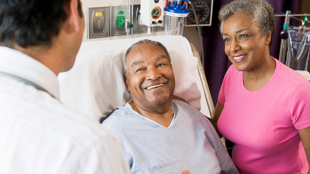 Couple talking to Doctor