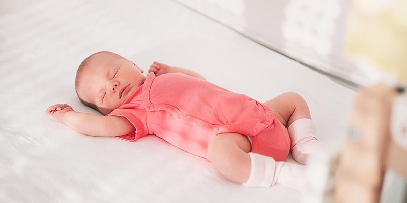 baby sleeping in crib