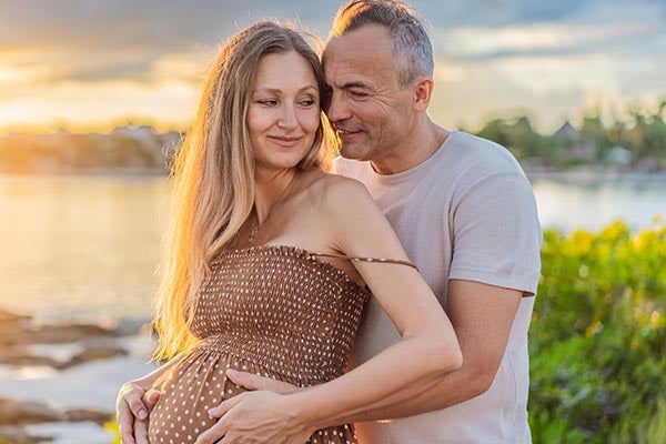pregnant older couple