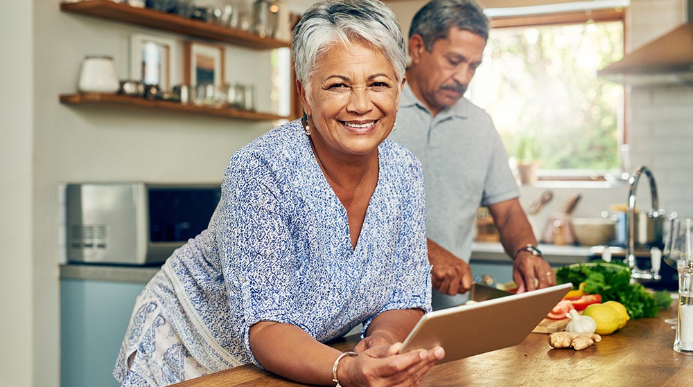Couple following a healthy recipe